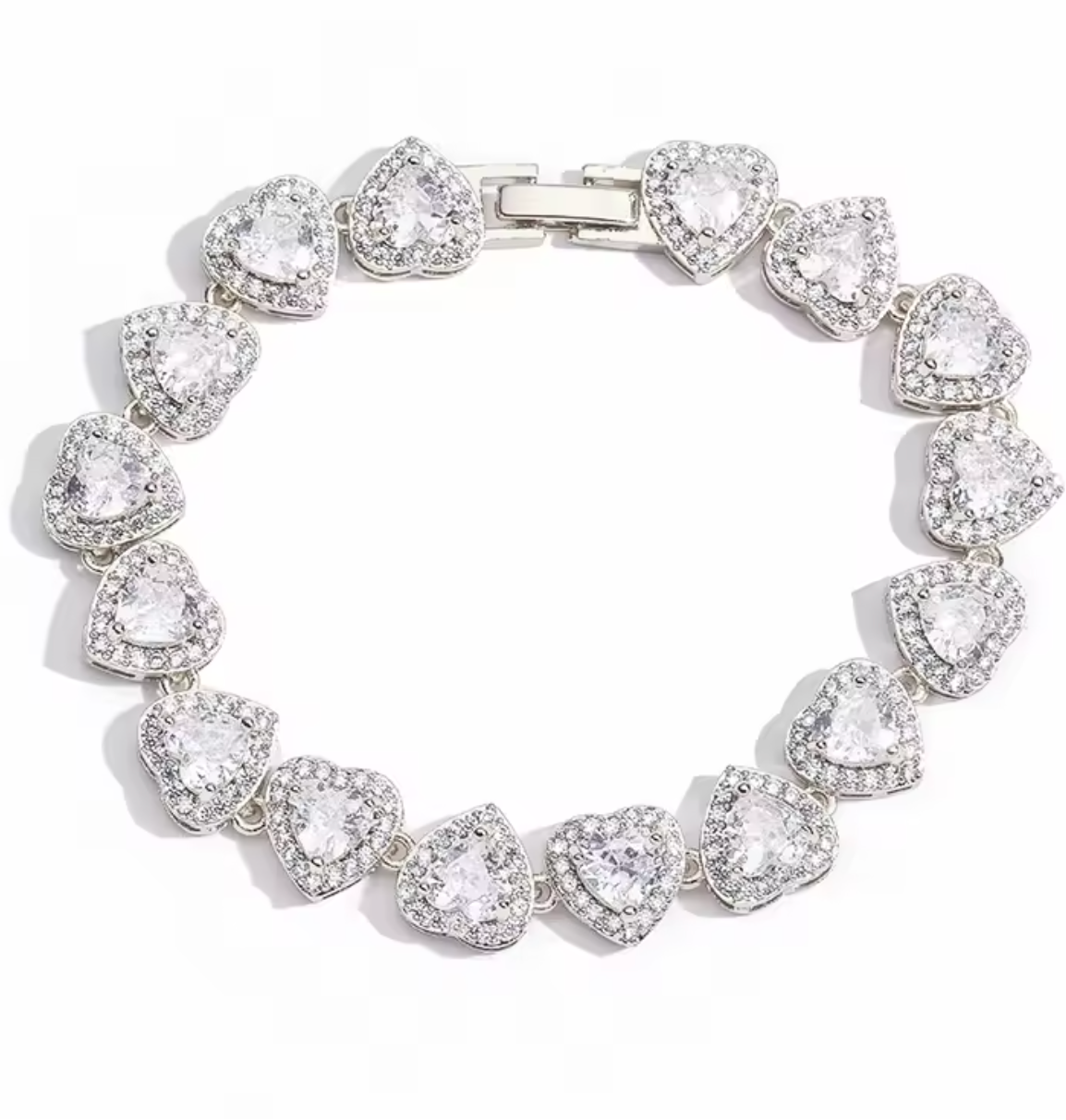 Silver bracelet with heart-shaped clear gemstones on a white background